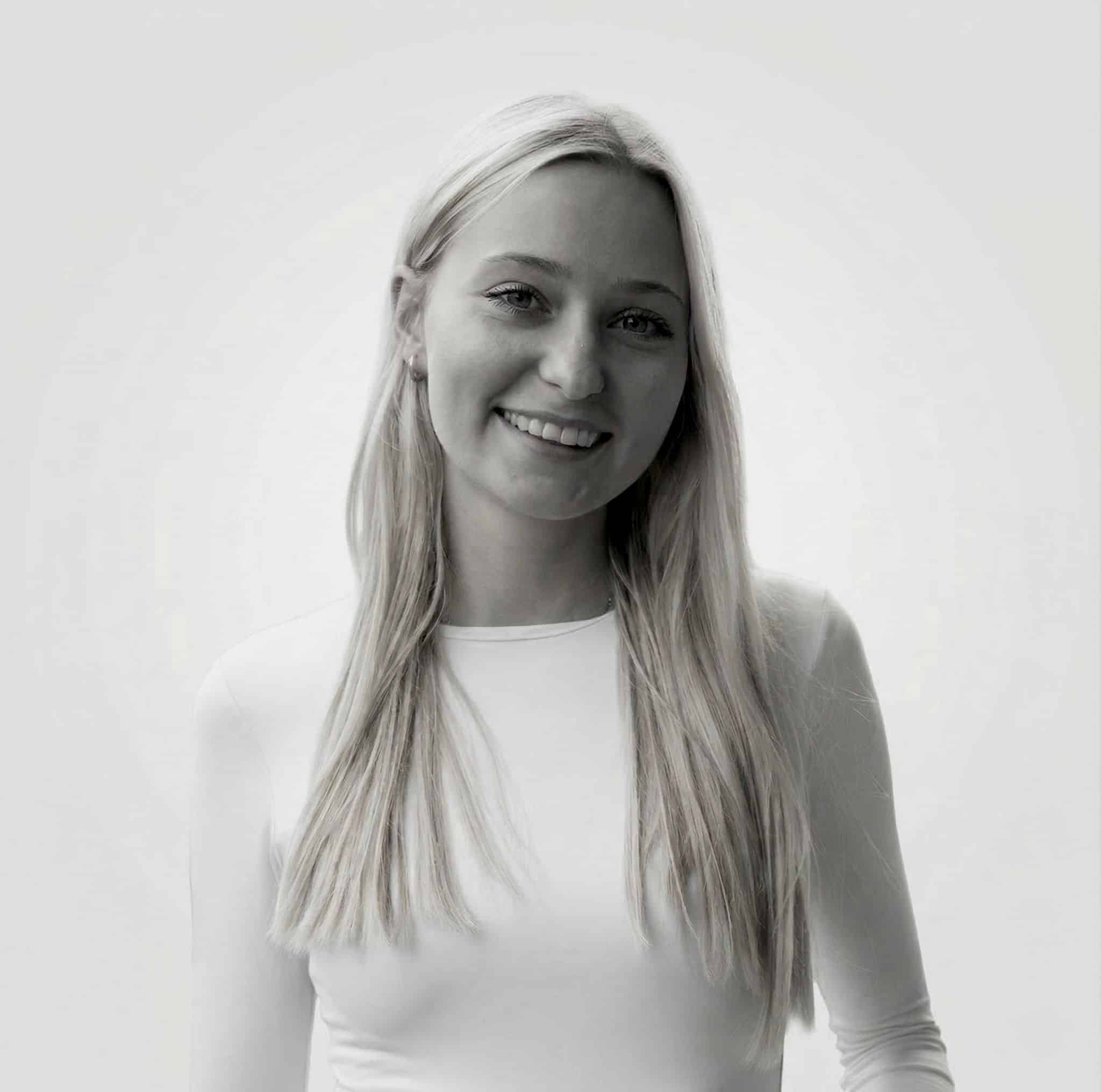 Smiling woman with long blond hair bright and elegant image you real estate agency