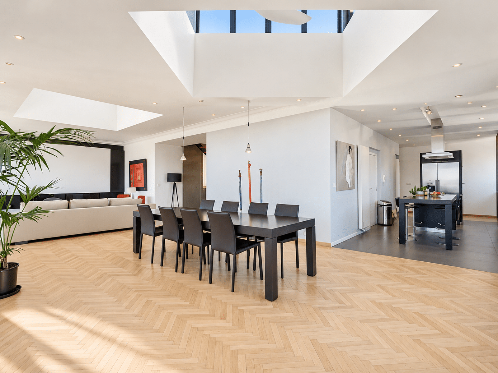 Dining room and open kitchen - You Real Estate Agency Contemporary home with a bright living room, dining room, and open-concept designer kitchen.
